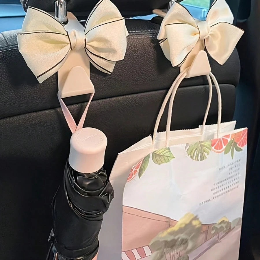 2pcs Elegant Bow-Knot Car Seat Headrest Hooks- White Multifunctional Headrest Hanger, For Vehicle Storage And Organization, Fashionable Car Interior Accessories, Car Seat Accessories