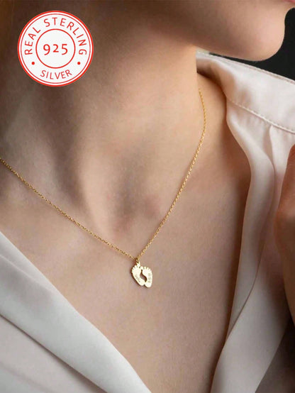 A 925 Silver Warm And Lovely, Uniquely Designed Custom Necklace With Footprint Pendant Can Be Engraved With English Names And Birthdays Of Family Members. It Is A Well-Made Jewellery Accessory Gift Fo