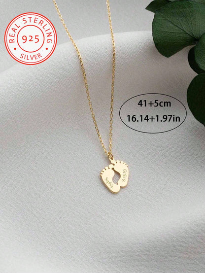 A 925 Silver Warm And Lovely, Uniquely Designed Custom Necklace With Footprint Pendant Can Be Engraved With English Names And Birthdays Of Family Members. It Is A Well-Made Jewellery Accessory Gift Fo