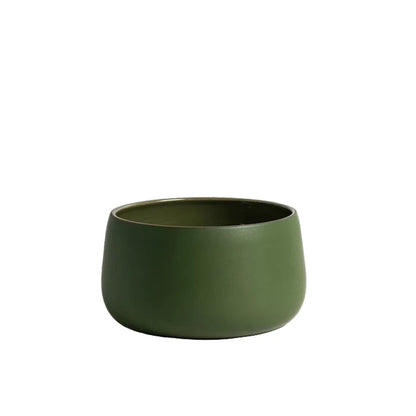 green serving bowl on white background