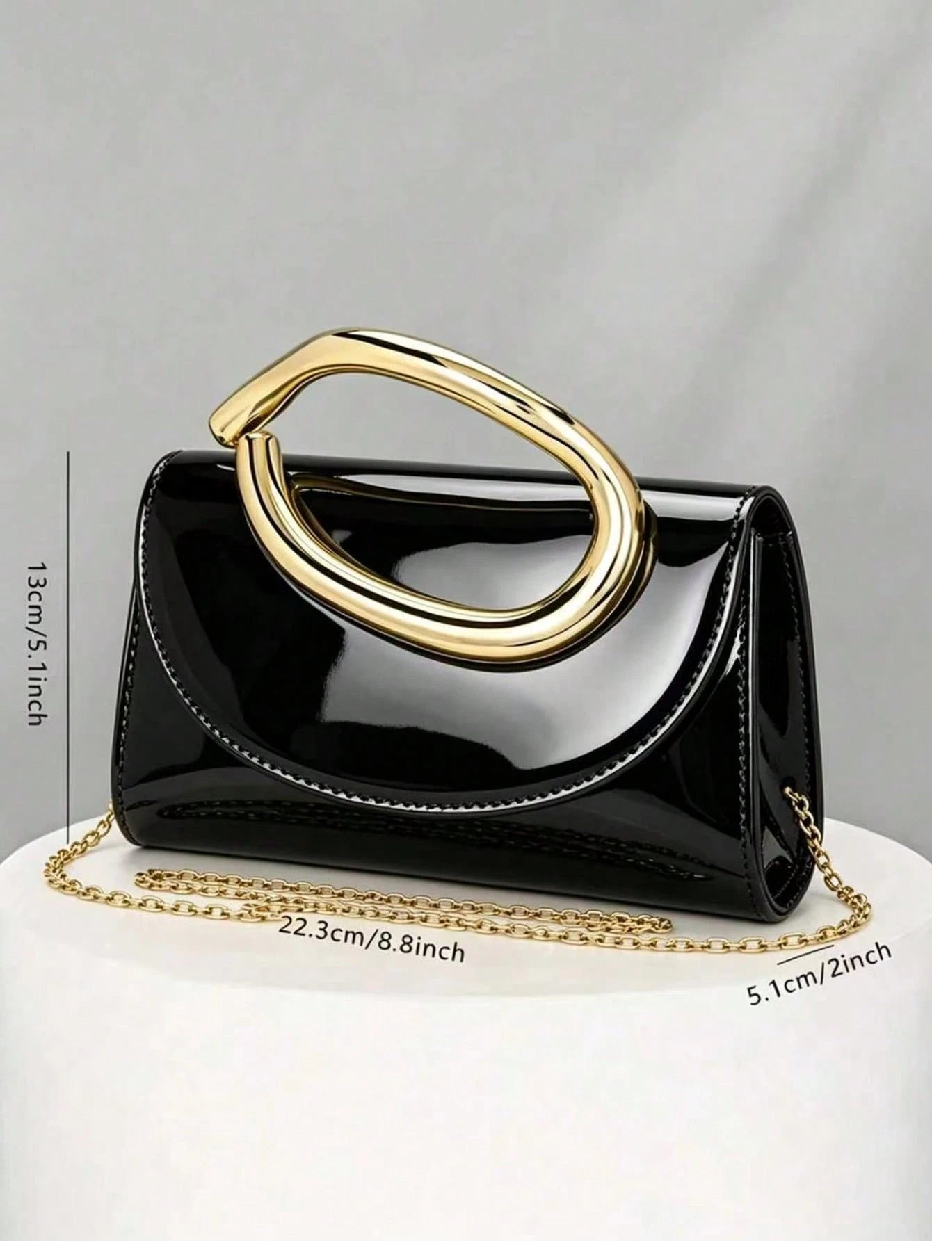 Glossy Evening Clutch With A Metal Ring And Flap Design-A Sophisticated, Vintage-Style Bag Perfect For Weddings And Dates.