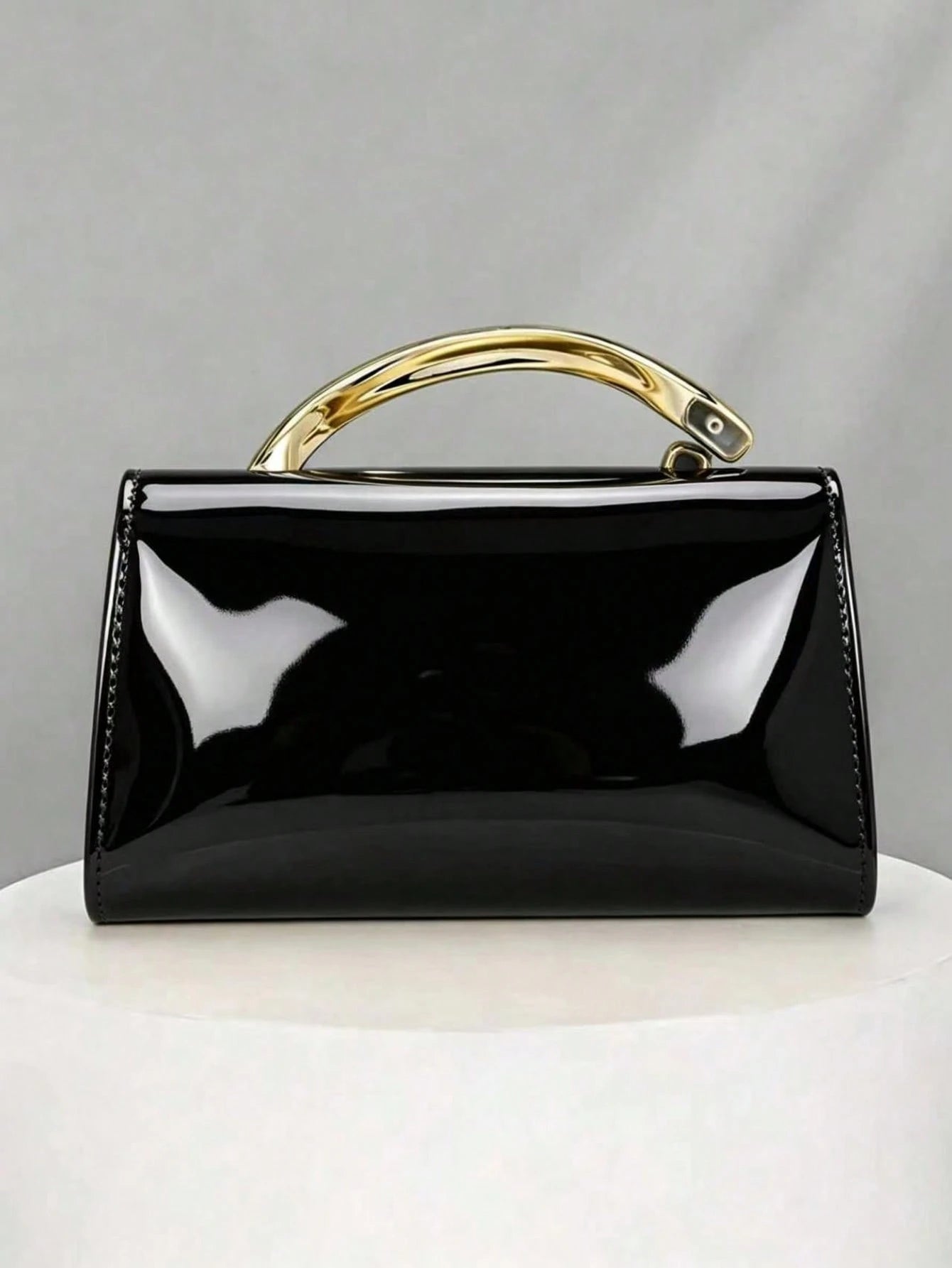 Glossy Evening Clutch With A Metal Ring And Flap Design-A Sophisticated, Vintage-Style Bag Perfect For Weddings And Dates.