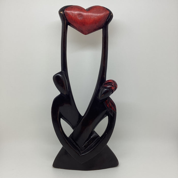 Uplifting Our Love wooden sculpture