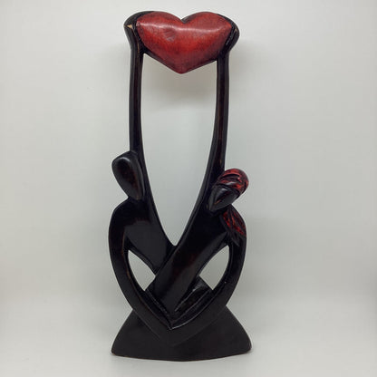 Uplifting Our Love wooden sculpture