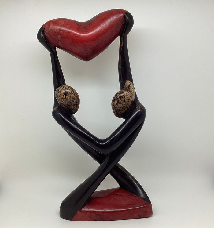 Uplifting Our Love wooden sculpture