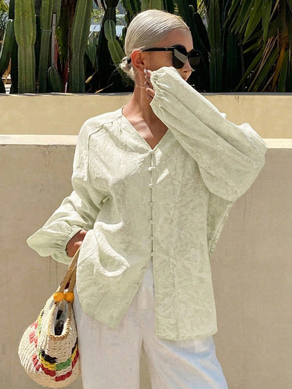 Livesso Women's White Printed V-Neck Petal Sleeve Vacation Blouse For Summer Holiday Thin Clothing
