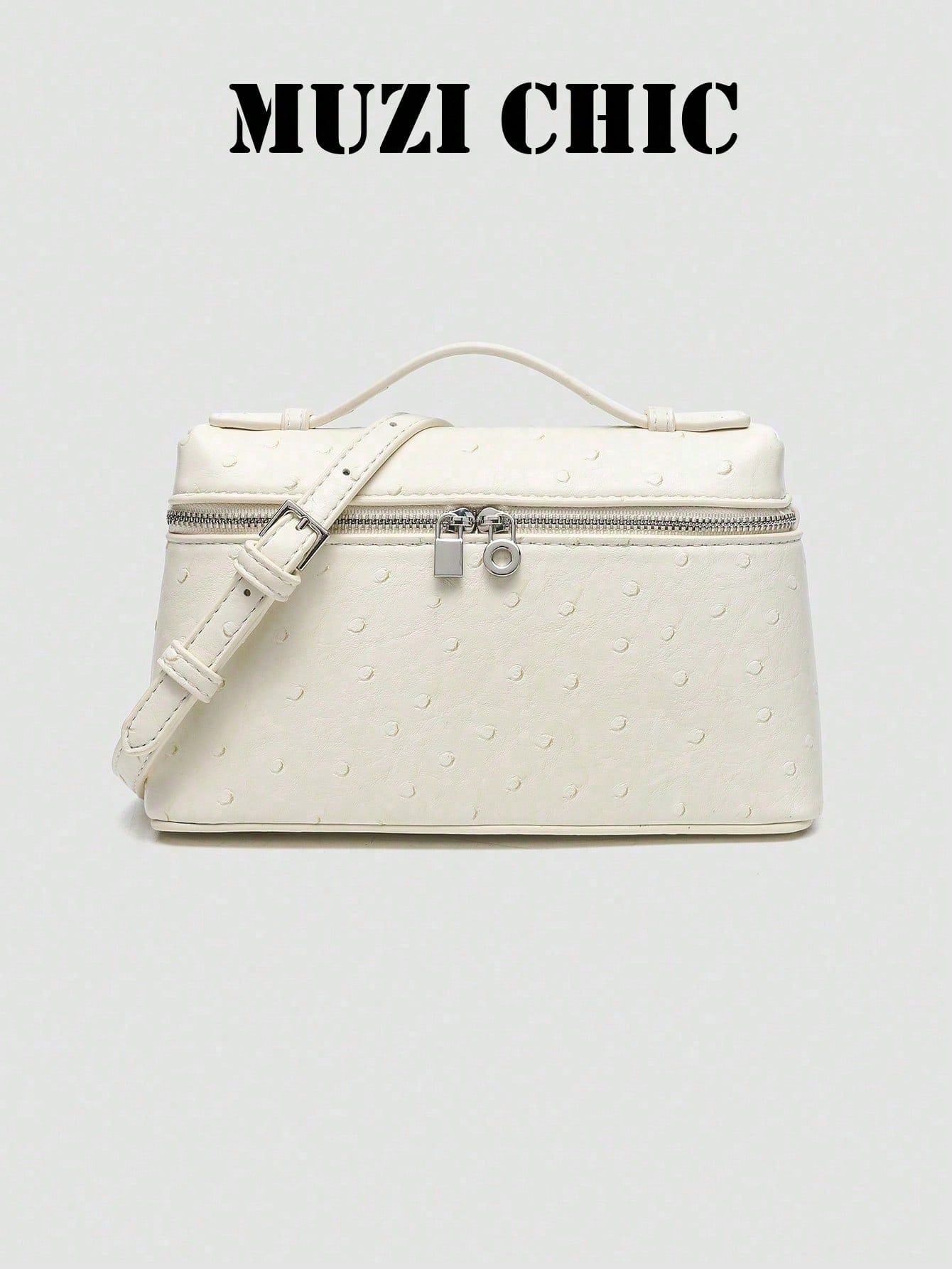 Minimalist Fashion Handbag With Polished Silver Hardware And Top Handle. The Simple Silhouette And Luxurious Texture Exude Understated Parisian Elegance, Perfect For Various Daytime And Evening Occasi