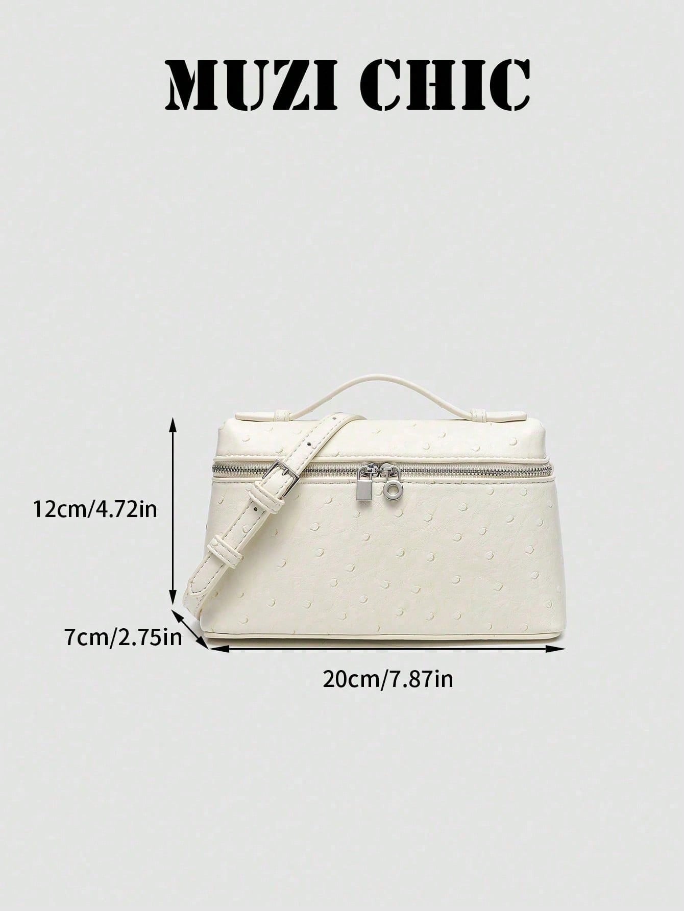 Minimalist Fashion Handbag With Polished Silver Hardware And Top Handle. The Simple Silhouette And Luxurious Texture Exude Understated Parisian Elegance, Perfect For Various Daytime And Evening Occasi