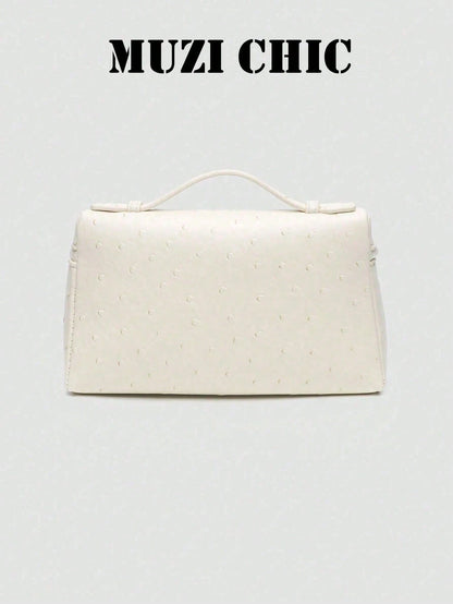 Minimalist Fashion Handbag With Polished Silver Hardware And Top Handle. The Simple Silhouette And Luxurious Texture Exude Understated Parisian Elegance, Perfect For Various Daytime And Evening Occasi