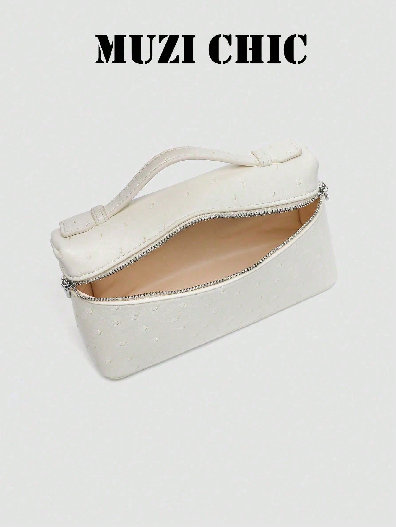 Minimalist Fashion Handbag With Polished Silver Hardware And Top Handle. The Simple Silhouette And Luxurious Texture Exude Understated Parisian Elegance, Perfect For Various Daytime And Evening Occasi