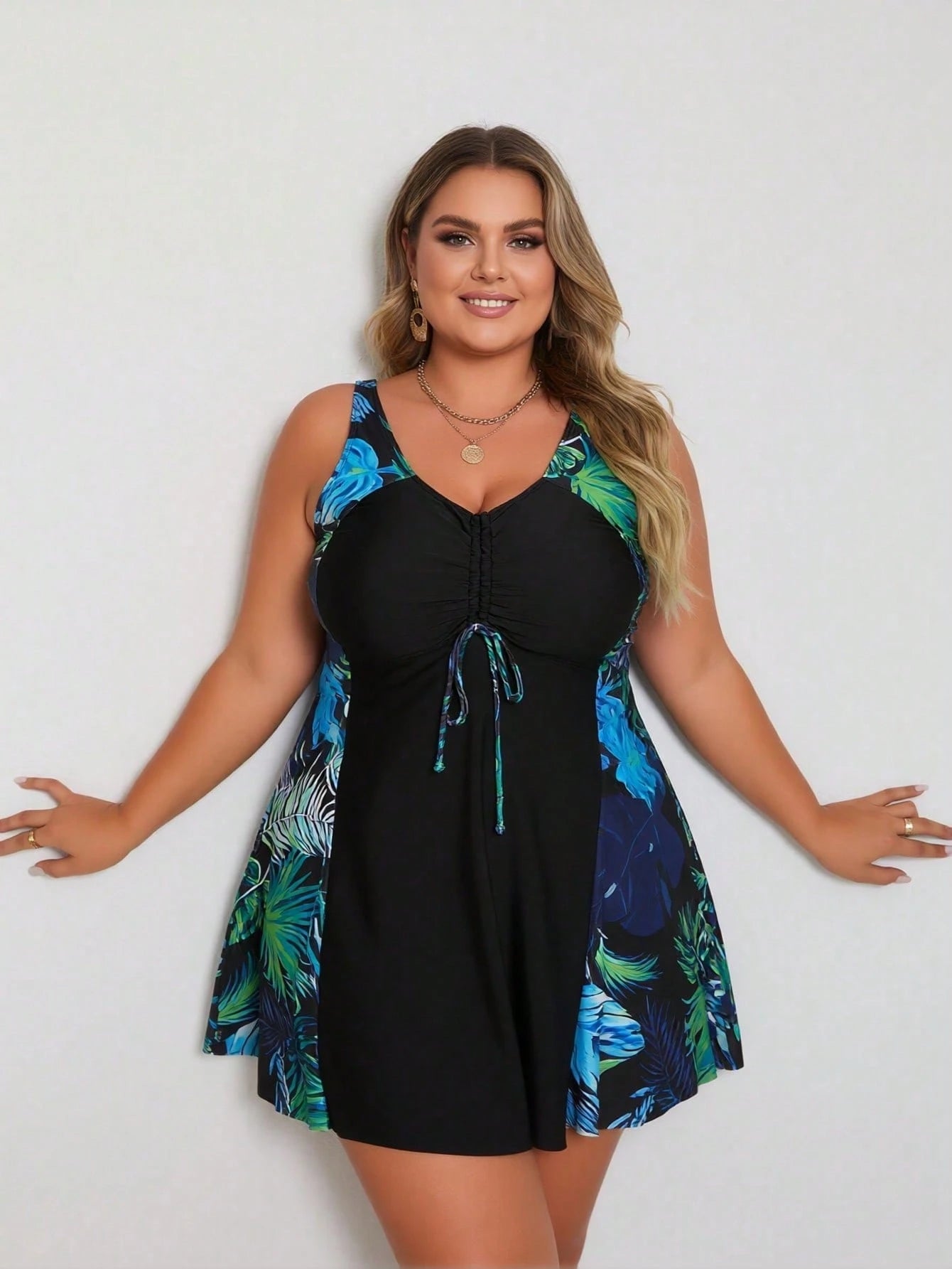 Plus Size Tankini Top With Tropical Print And V-Neck, Ruched Detail Swim Skirt, And Slight Stretch Fabric For A Casual Beach Look