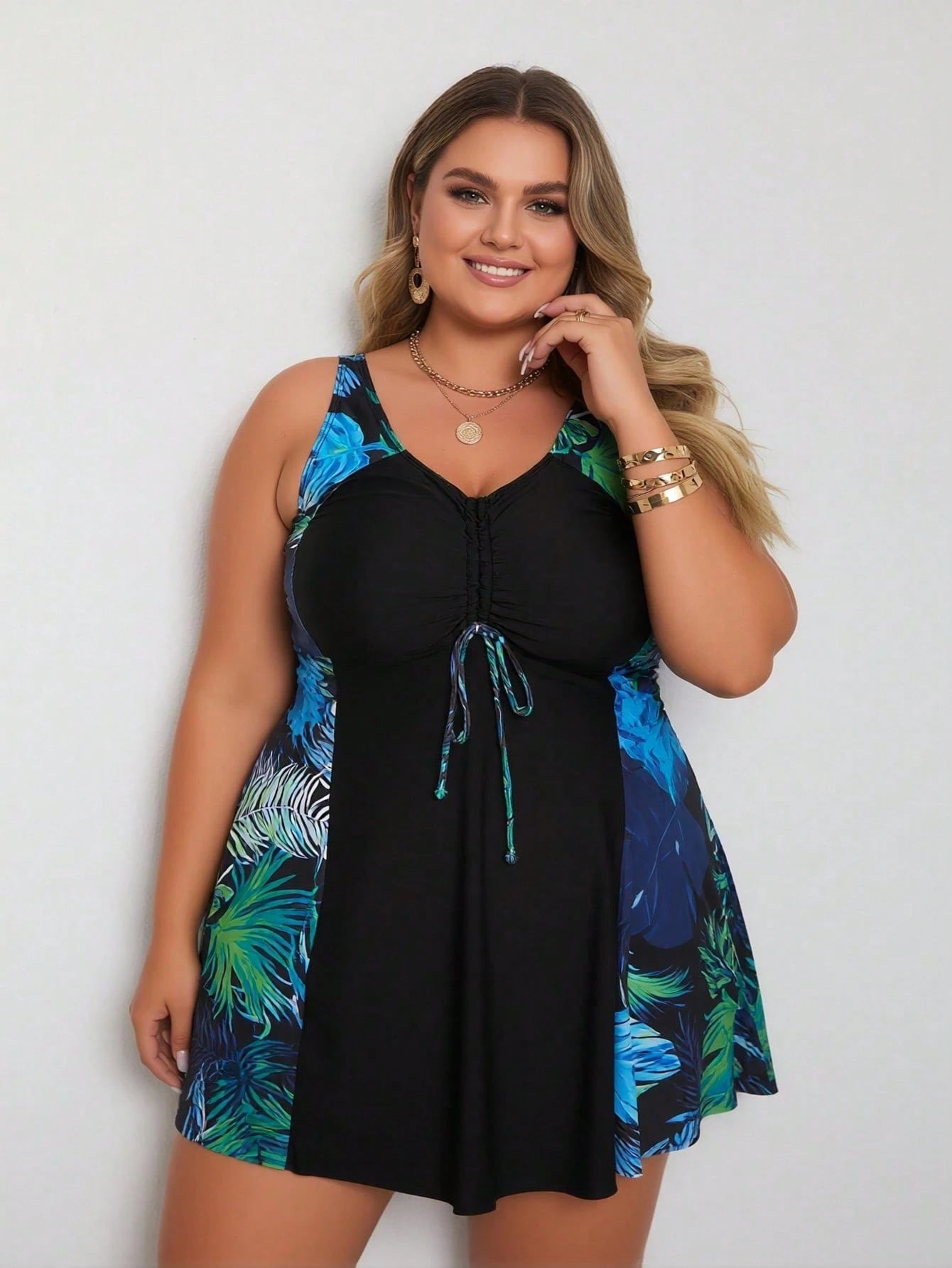 Plus Size Tankini Top With Tropical Print And V-Neck, Ruched Detail Swim Skirt, And Slight Stretch Fabric For A Casual Beach Look