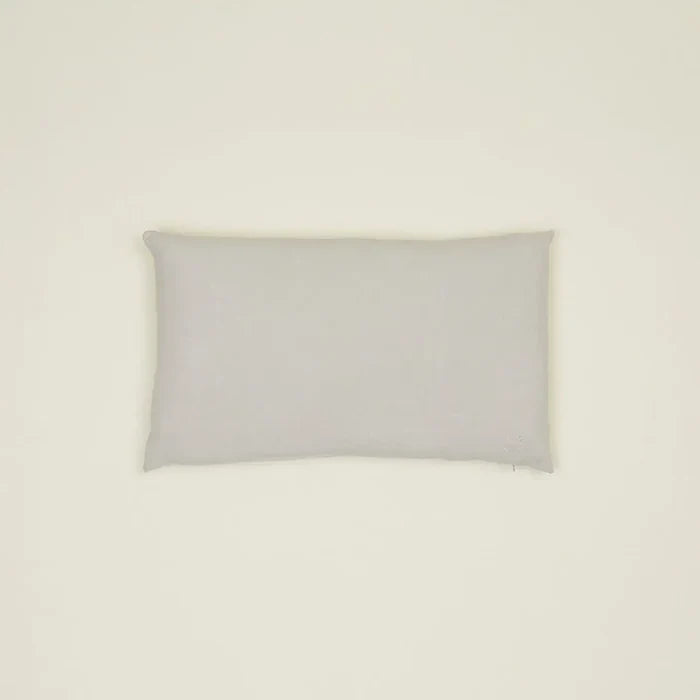 Simple light gray linen pillow, made from high-quality Belgian linen, featuring a cozy feel and oversized down insert.