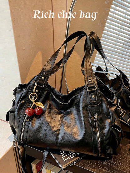 This Classic And Fashionable New Multi-Functional Black Color Shoulder Bag Is Designed With A Large Capacity Vintage PU Material,With Cherry Pendant