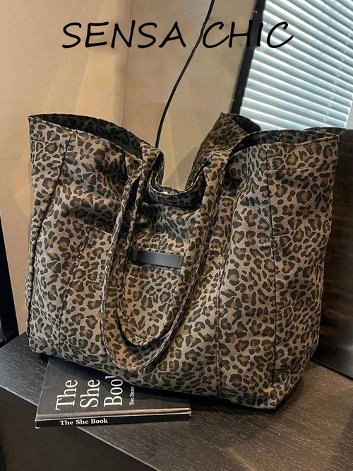 This Leopard Print Large Capacity Tote Bag Features Multiple Pockets And An Open Design, Allowing You To Easily Store And Retrieve Items. With Ample Space, It Can Hold Books And Tablets, Making It Sui