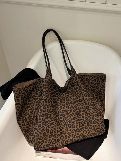 This Leopard Print Large Capacity Tote Bag Features Multiple Pockets And An Open Design, Allowing You To Easily Store And Retrieve Items. With Ample Space, It Can Hold Books And Tablets, Making It Sui