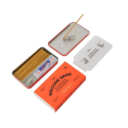 Collection of incense sticks and packaging on a white background